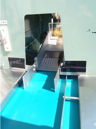 錠剤全数<br>検査機<br><br>錠剤目視<br>検査機