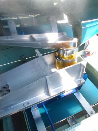 錠剤全数<br>検査機<br><br>錠剤目視<br>検査機